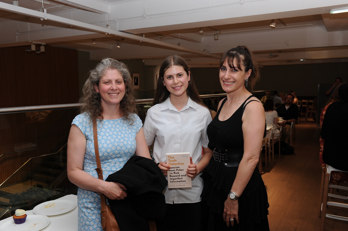 Philippa Woodley holding Alex O'Brien's book