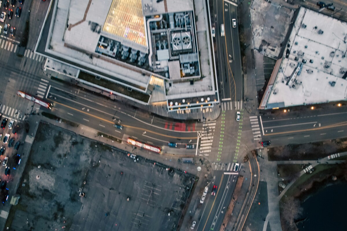 Overhead view of a street intersection in Seattle’s South Lake Union neighbourhood, showing surrounding buildings, roads and pedestrian crossings.