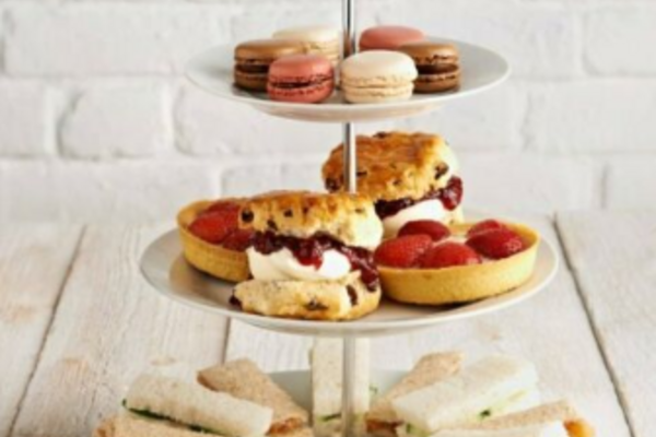 afternoon tea displayed on a cake stand