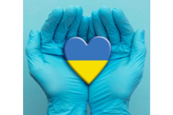 hands holding a heart the colours of Ukrainian flag