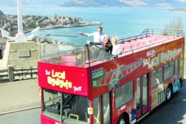 photo of red open top bus parked at Lyle Hill in Greenock