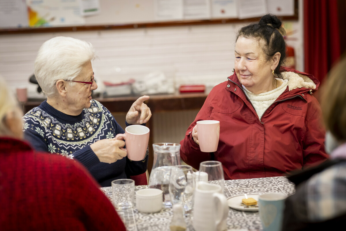 Women chatting and drinking tea