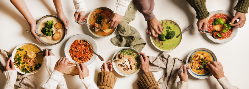 soup and peoples hands, From above looking down at a table