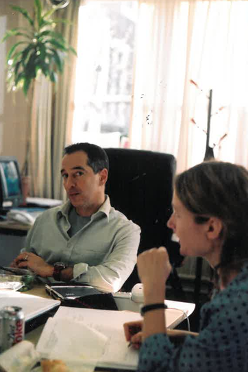 A Young Pierre Makhlouf sitting in an office with a colleague. 