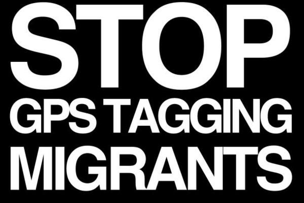white text on black background that says stop GPS tagging migrants