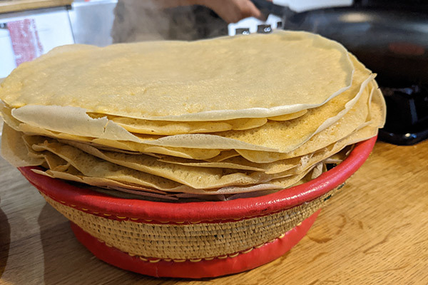 An image of a pile of injera