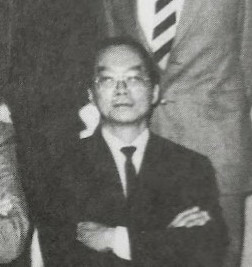 Cheng, in a seated group