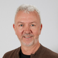 Ian Williams - a man with short grey hair and a beard