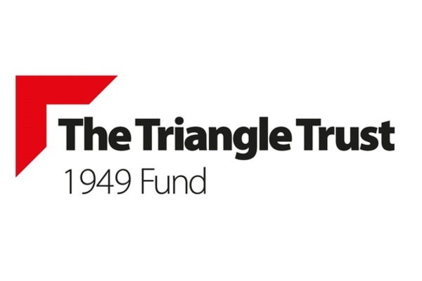 The Triangle Trust 1949 Fund logo, black text with The Triangle Trust in bold and a red triangle above 'The'
