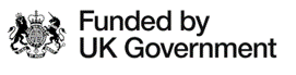 Funded by UK Government written in black on a white background, with a crest to the left of the logo