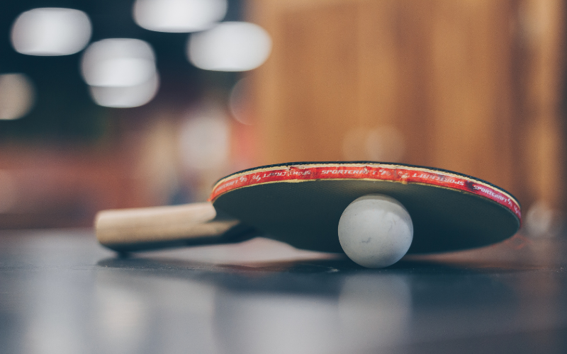 Table tennis paddle and ball