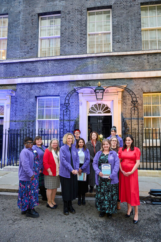 Mothers For Mothers staff standing outside 10 Downing Street