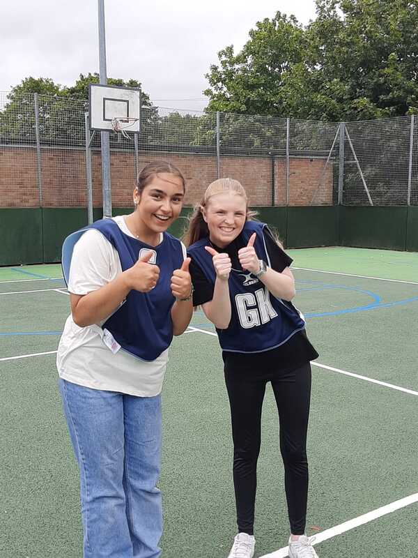 Girls at Vision 4 Youth youth club playing netball