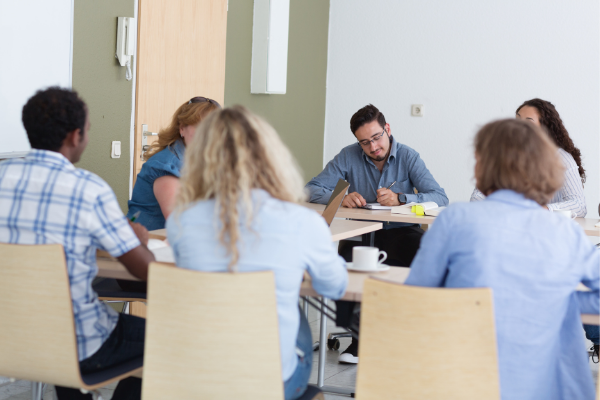 Young people in classroom learning