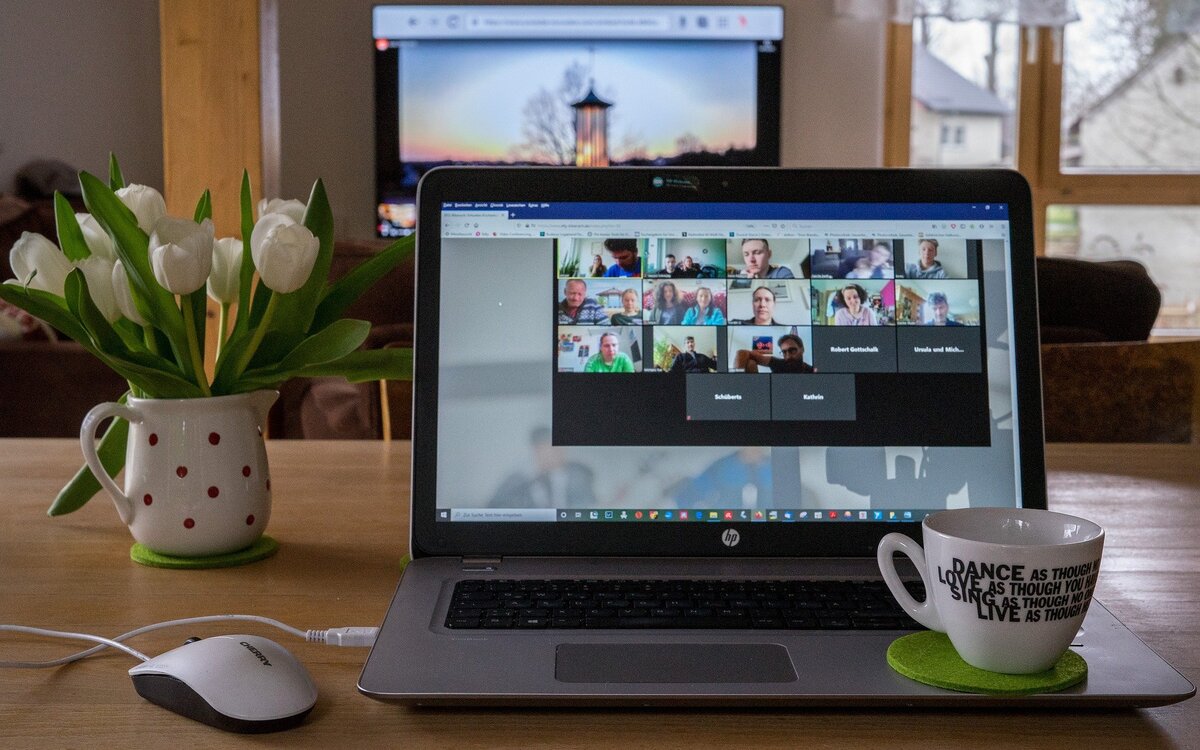 Image of a lap top with online video taking place
