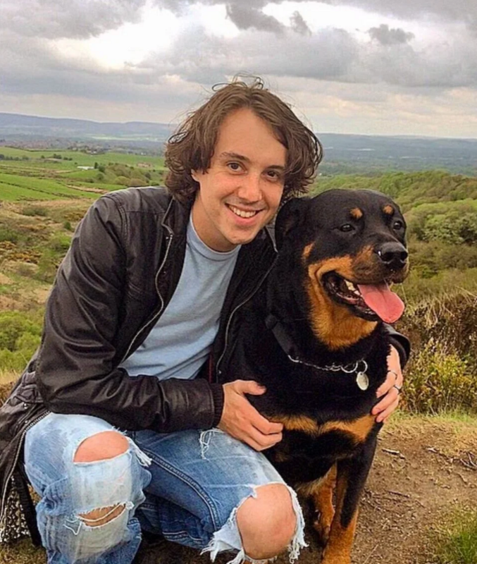 Image of Oliver Robinson and his dog