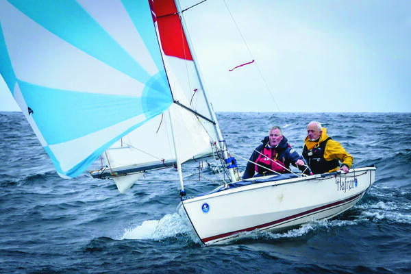 A stunning photo of Hafren and crew returning from St Kilda