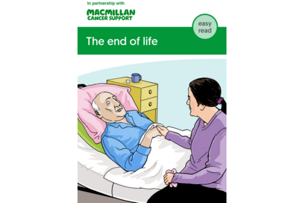 Front page of the leaflet with an old person lying in bed and a person with longer hair sitting by his side and holding his hand.