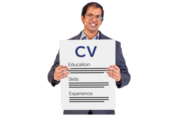 Person with grey suit, short dark hair and glasses holding a large piece of paper with the word CV written on it.