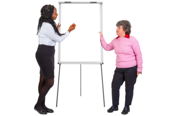 2 people standing in front of a chart board to present a training
