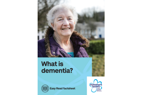 Front cover of the easy read leaflet on dementia from the Alzheimer society, showing the photo of an elderly woman.