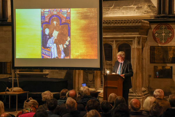 Christopher de Hamel giving a lecture on the Sarum Master Bible.