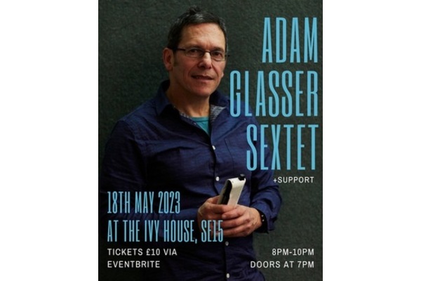 Adam Glasser sextet - photo of Adam with harmonica 