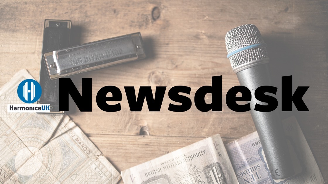 Image: Newsdesk header, Microphone and harmonicas on a wooden table