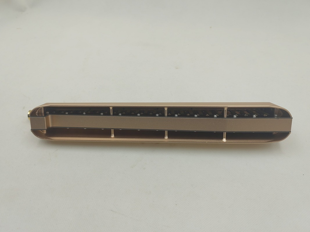 Oritta 24 hole harmonica back view