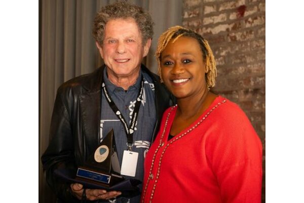 Lee Oskar with Kimberly Horton, Blues Foundation President and CEO
