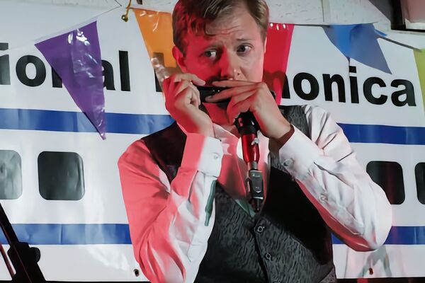 Joe Powers playing at a previous HarmonicaUK(NHL) festival