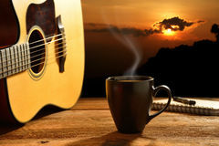 Cup of coffee, guitar and harmonica