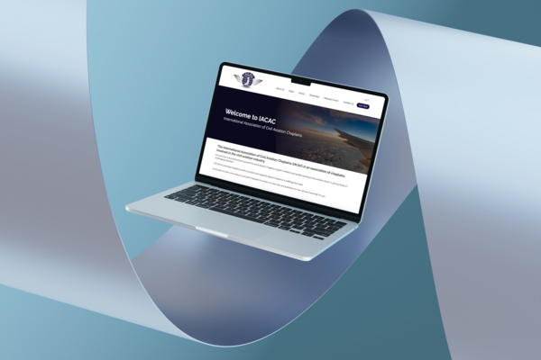 A mockup of the IACAC site on a laptop