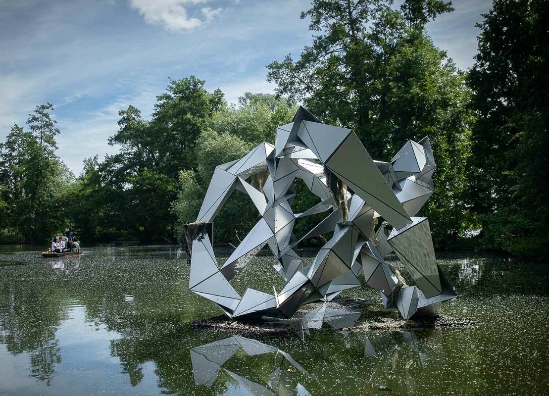 contemporary metal sculpture landscape water 
