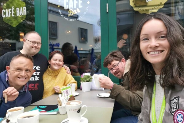Group of service users out at a cafe