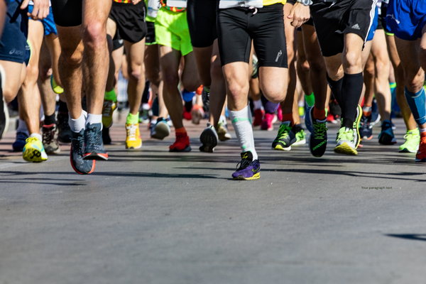 People running a marathon with a link to the marathon spaces that Learn to Love to Read can offer
