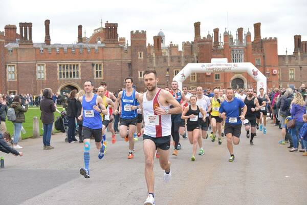 Runners in front of Hampton Court palace