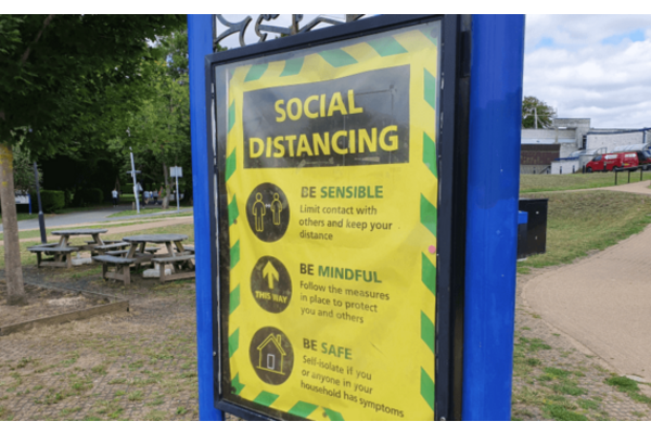 A social distancing poster