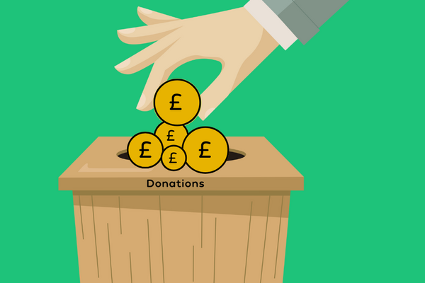 Green background. Image of a hand putting money into a box.