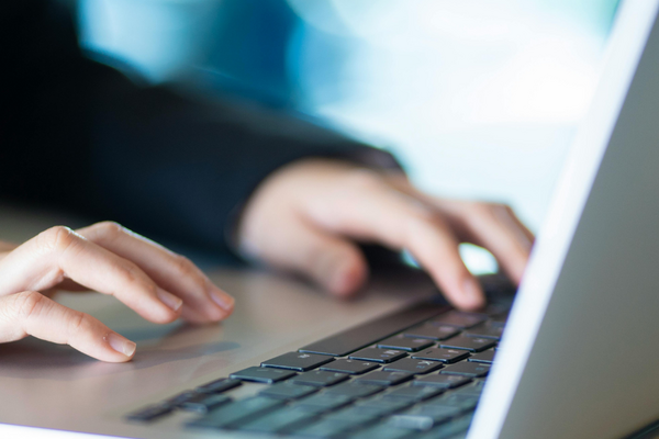 Image of person on laptop
