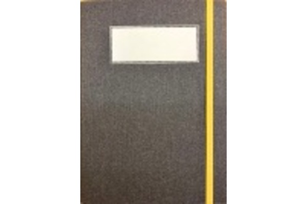 Photo of a dark grey cloth binding with a blank white label and yellow elastic foredge closure