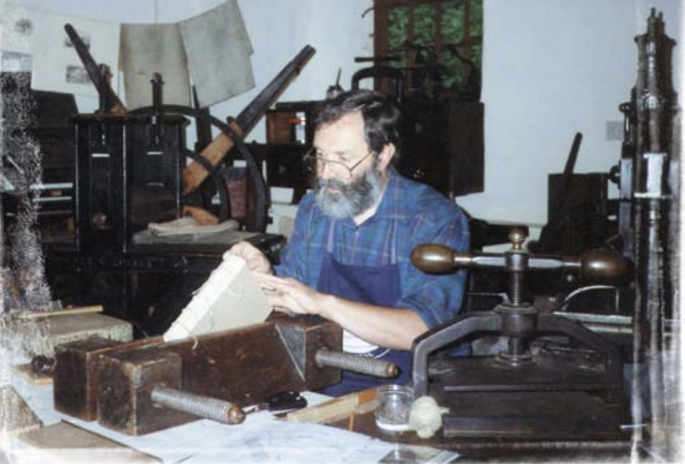 Photo of bookbinder at work