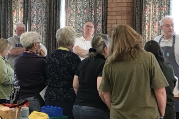 Photo of people at a workshop with Dominic Riley