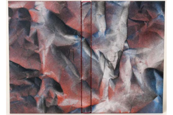 Marcus Janssens' binding of Alice im Wunderland in orange, white, and blue dyed leather in an abstract pattern