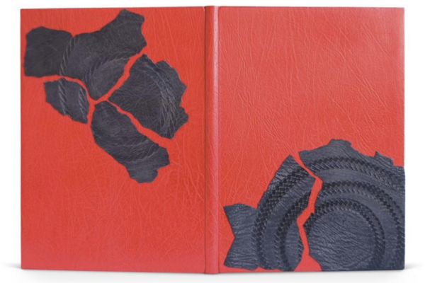A fine binding of Antigone bound by Rachel Ward-Sale in bright red goat with grey leathen onlays in the shape of cracked earth or pottery shards