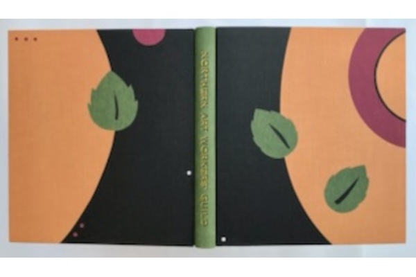 Fine binding in tan and black goat with green onlays of leaves. 