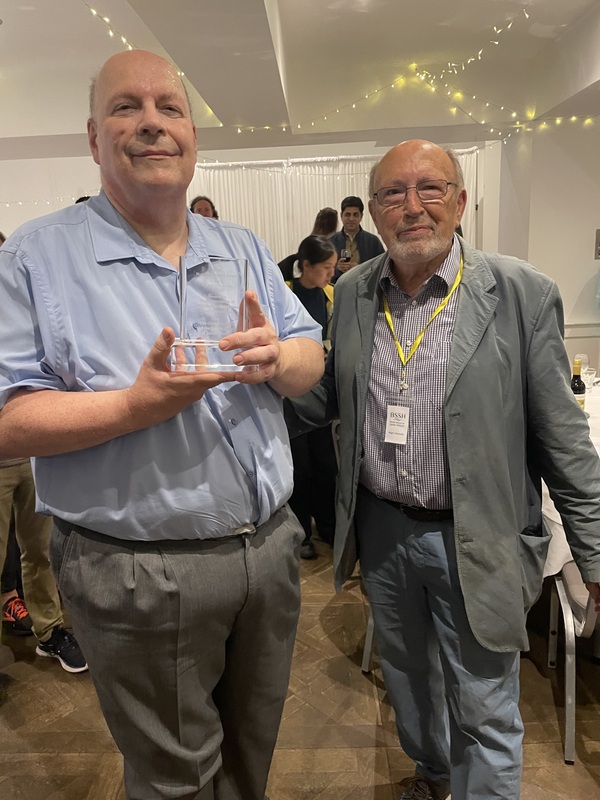 ACS Chair, John Bryant receives the 2024 Howard Milton Award from Nigel Hancock