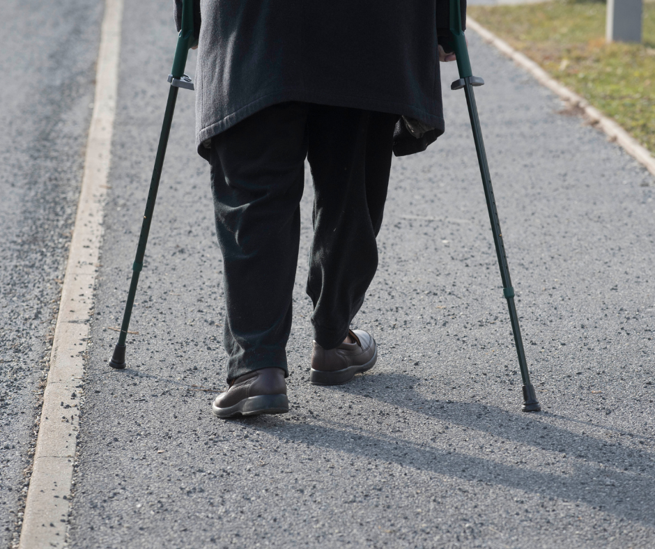 man walking with walking sticks