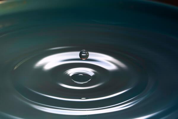 water droplet creates ripple effect